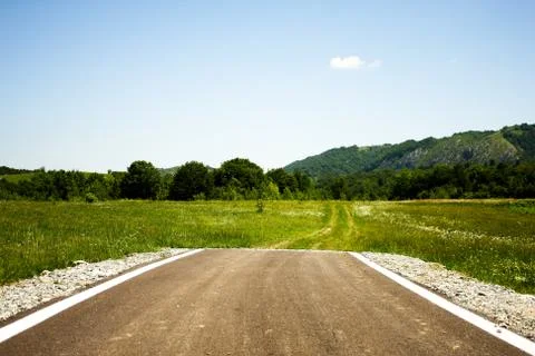 The end of a paved road Fotos de archivo