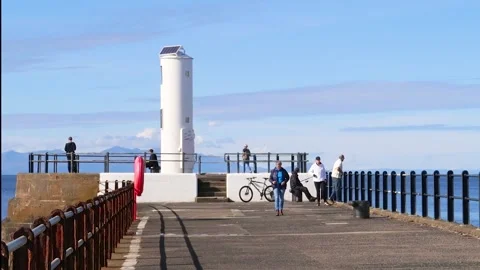End of pier lighthouse, overlooking the Firth of Clyde, Ayr, Scotland, UK Stock Footage 285649515