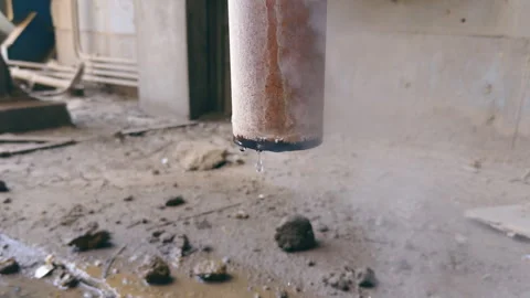 The end of the pipe has water dripping and faint smoke. Heating, cooling Stock Footage 302765309