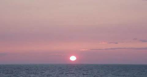 End of red orange sunset over lake or river in pink sky Vídeo Stock 165254673