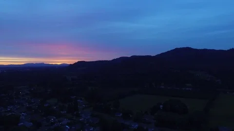 End of Sunset Over A Small Town in the Valley Stock Footage 76336932
