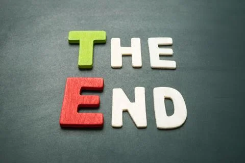 The End text on blackboard Stock Photos
