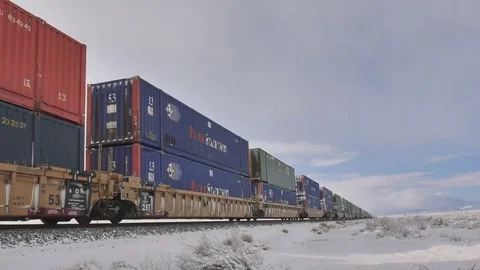 End of train with containers locomotive pushing pass away from camera Stock Footage 72888549