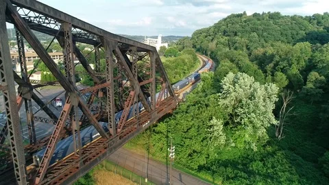 End of a Train Moving onto Bridge Vídeo Stock 92994234