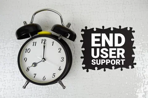 End User Support text with alarm clock on black background 写真素材