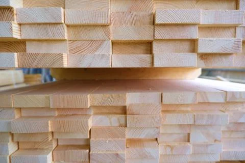 End view of stack of three-layer wooden glued laminated timber beams from pin 스톡 사진
