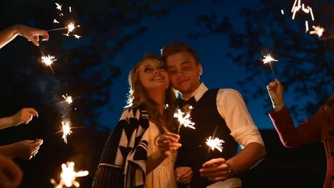 End of the wedding day. Many sparkles around couple Stock Footage 70402422