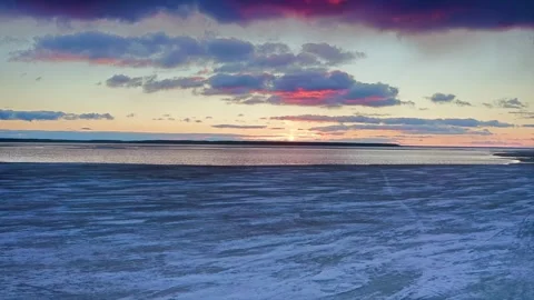 End of winter, river navigation opens, ice melts, air temperature rises. Aerial Stock Footage 257782648