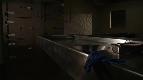 END OF THE WORKDAY AT THE MORGUE Stock Footage 73119766