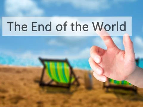 The End of the World - Hand pressing a button on blurred background concept . 写真素材