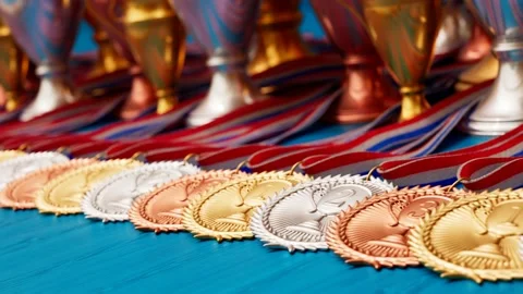 Endless animation of gold, silver and brown medals for winners. Trophies. Stock Footage 145769138