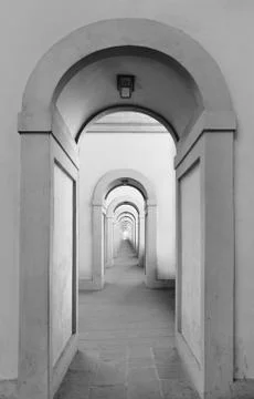Endless arched doorways repeating to infinity Stock Photos