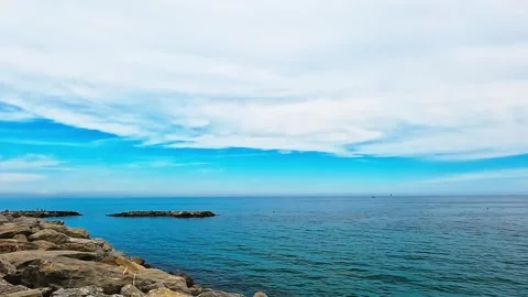 Endless Azure Horizon Under Clear Sunlit Coastal Atmosphere Stock Footage 327413976