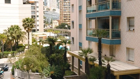 Endless balconies and windows, the road between the houses. 库存影片 113353371