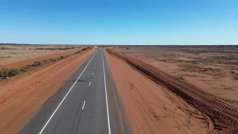 Endless Bitumen Through the Outback
A drone’s-eye view of a lone sealed road Stock Footage 313042813