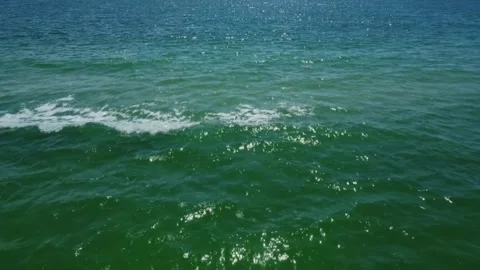 Endless Blue Ocean Surface Loop with Sparkling Light Reflections Stock Footage 311463265