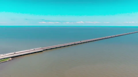 Endless bridge vanishing perspective over the massive Lake Pontchartrain in Stock Footage 346166097