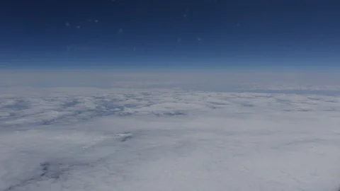 Endless clouds from an airplane window (2) Stock Footage 126769504