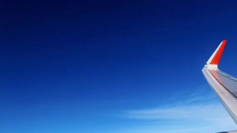 Endless clouds under the plane and the blue, bottomless blue sky, the plane Stock Footage 164449137