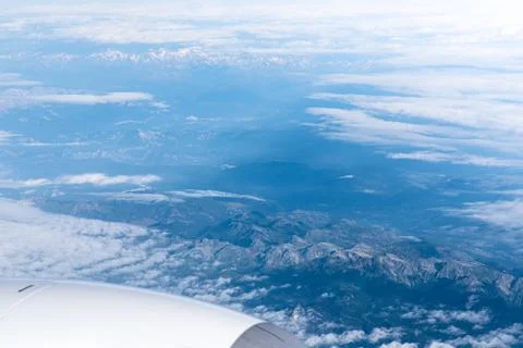 Endless cloudy sky, view from the airplane. Airline theme, travel and busines Fotos Stock