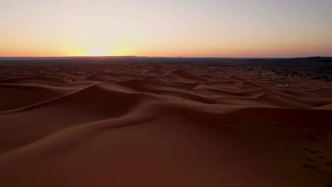 Endless dunes of the Erg Chebbi dune sea at sunrise near Merzouga Morocco Stock Footage 338168744