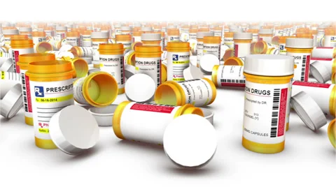 Endless Empty Pill Bottles front view Stock Footage 39885004