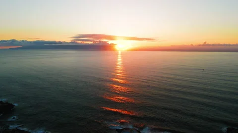 Endless expanse of ocean against sunset sky. Sun light, sea water waves. Zen Stock Footage 232389707