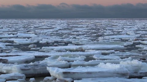 Endless expanse of sea. Ice drift to the coast quietly Stock Footage 75002896