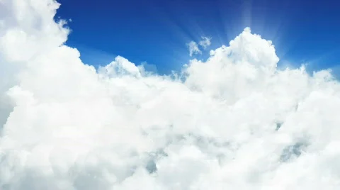 Endless flight through sunny clouds. Seamless Loop. Stock Footage