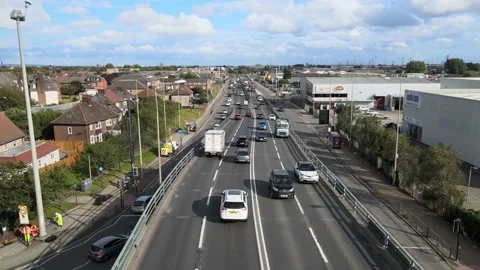 Endless flow of cars driving on multilane elevated road in town Stock-Footage 164685089