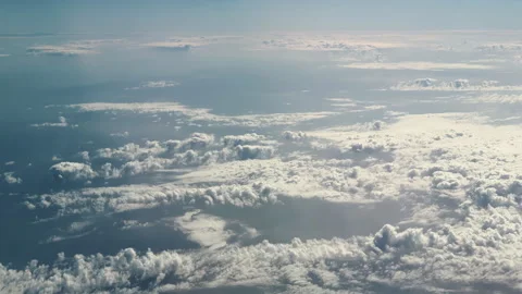 Endless fluffy cloudscape pattern in vivid blue sky background Stock Footage 346635271