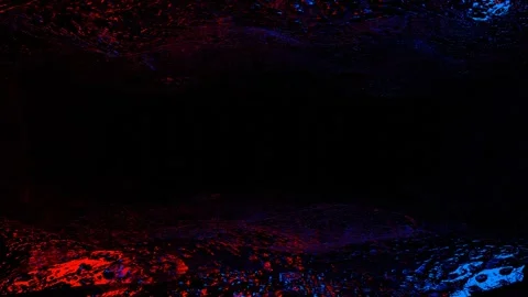 Endless forward movement inside a dark, endless cave with red and blue lighting. Stock Footage 301859382