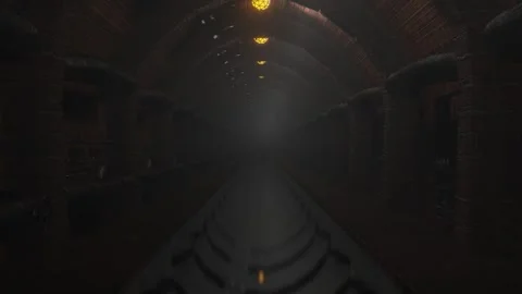 Endless forward movement inside dark foggy brick sewer tunnel with old rusty pip Stock Footage 311720842