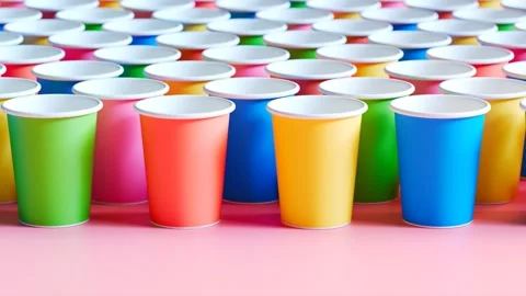 Endless front view sequence of colorful party disposable cups. Take-away bar. Vidéo 201183645