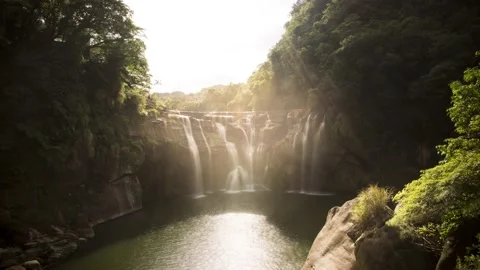 Endless Loop Shifen waterfall at sunset in beautiful hazy sun light, Taiwan Stock Footage 143720390