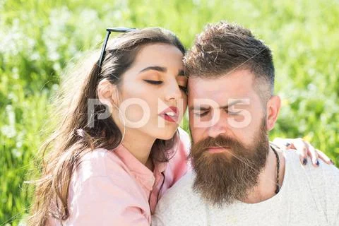 Endless love. One and only. Sensual woman hug bearded man on summer meadow. Lost Stock Photos