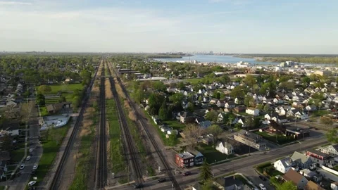 Endless railway leading through small town of Wyandotte, aerial fly view Stock Footage 201838856