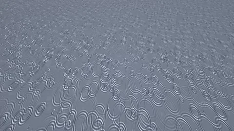 Endless raindrops falling and creating ripples on a blue water surface. 4K 스톡 동영상 342688140