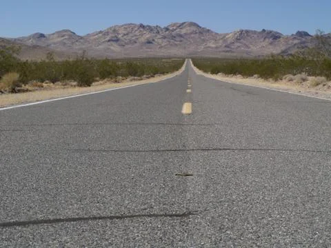 Endless road at the desert Photos