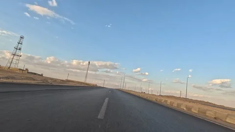 Endless road scenery while driving across Cairo Fayoum Desert Road Egypt desert Stock-Footage 330081567