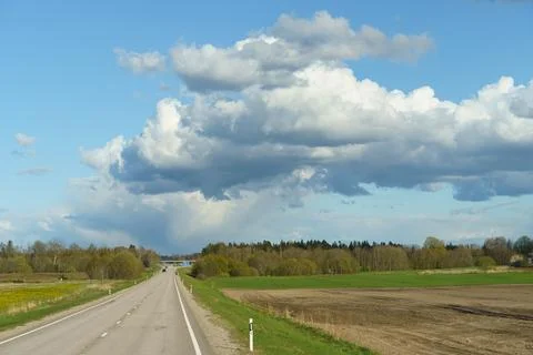 Endless Road Under Dynamic Cloud Formation 스톡 사진