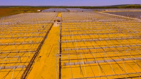 Endless rows of greenhouse frames Stock Footage 109375754
