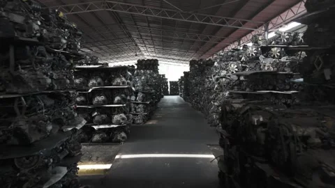 Endless Rows of Stacked Car Engines Inside Covered Auto Recycling Facility 스톡 동영상 317209890