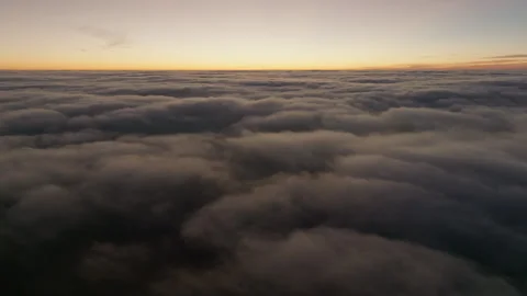 Endless Sea of Clouds at Golden Hour Stock Footage 330759428