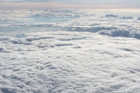 Endless sea of white clouds Stock Photos