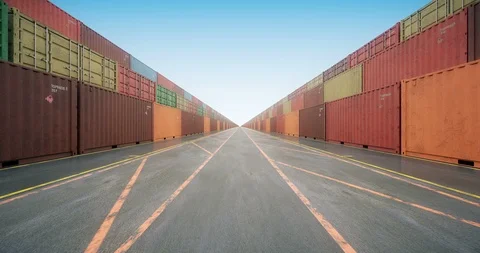 Endless stacks of cargo shipping containers under blue sky Video stock 114122757