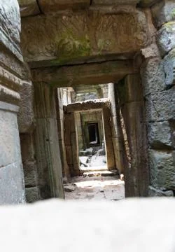 Endless tilted stone doorways in archaeological ruins Stock Photos