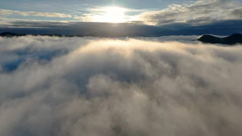 Endless white clouds and mist covering the carpathian mountain range, aerial Stock Footage 329244648