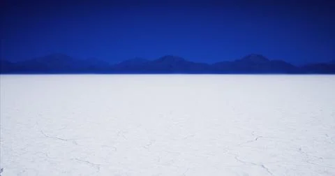 Endless white salt flat under a clear blue sky in remote location Stock Illustration