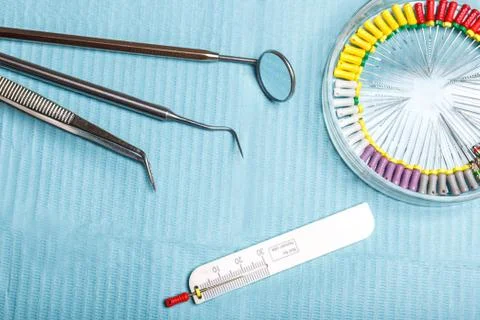 Endodontic instruments on the napkin. Top view. Stock Photos